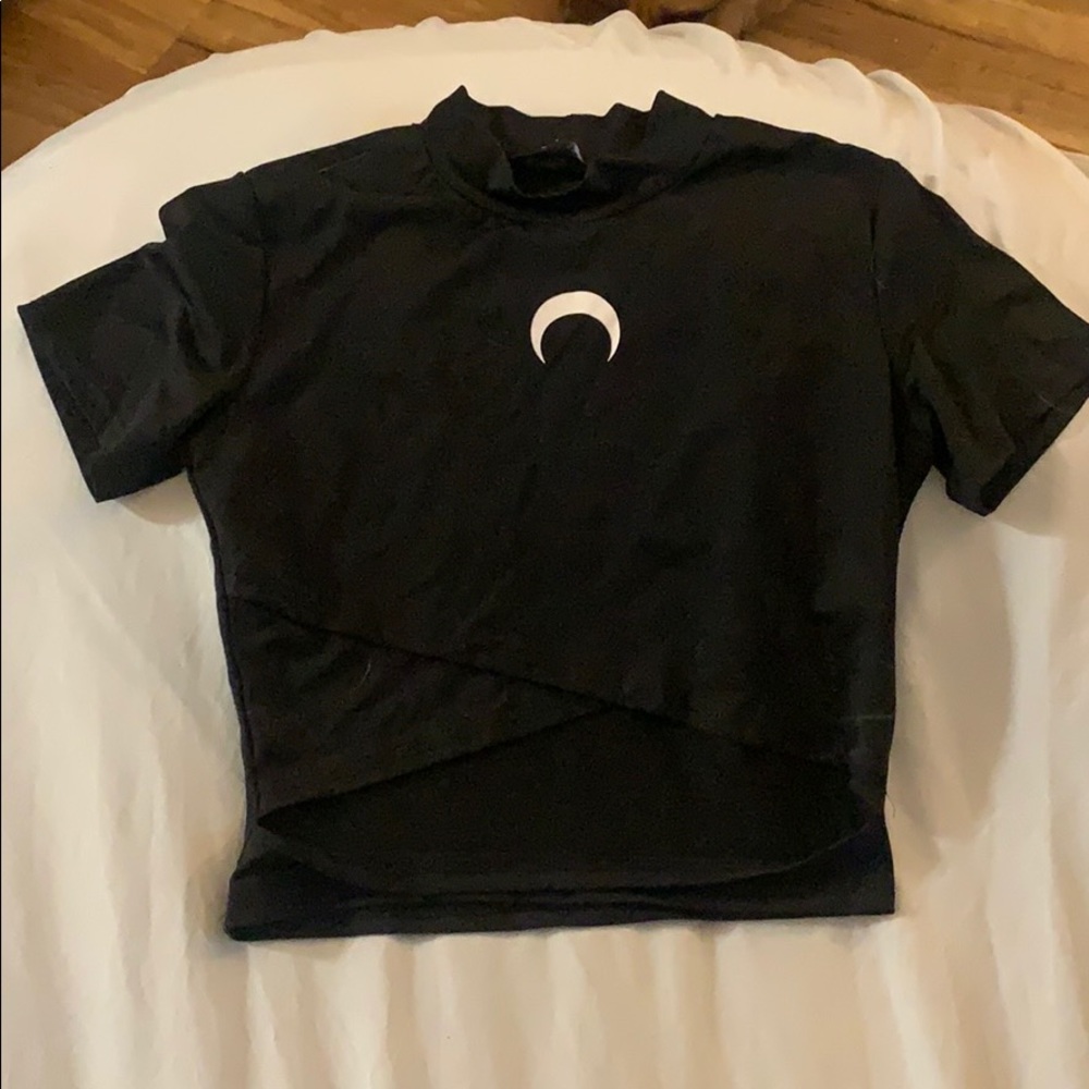 Crop turtleneck with crescent moon and cut out